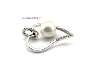 colgante oro 18k con piedra con diamante