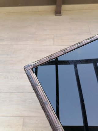Mesa de terraza cristal negro y ratan marron