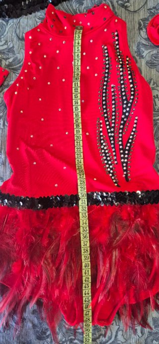 Maillot patinaje rojo con plumas