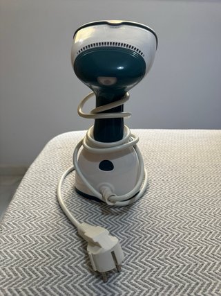 Vaporizador de ropa Tomado