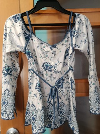 Blusa estampada floral manga larga