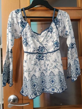 Blusa estampada floral manga larga
