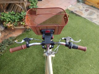 Bicicleta niña B-Twin rosa con cesta con marchas