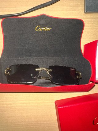 Gafas de sol Cartier doradas y negras