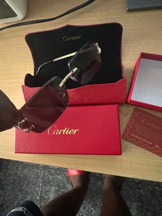 Gafas de sol Cartier doradas y negras