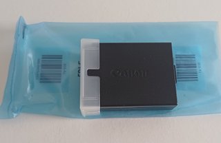 Objetivo Canon + Batería + Bolsa