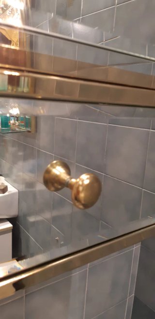 Armario de baño acero y dorado con espejo