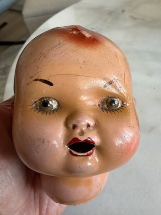 Cabeza de muñeca antigua de porcelana