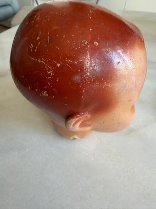 Cabeza de muñeca antigua de porcelana