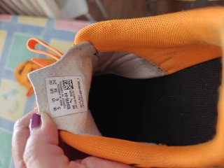 Botas de fútbol Puma niño naranja