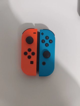 Nintendo Switch OLED Azul/Rojo Poco Uso