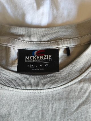 Camisetas McKenzie Grises y Blancas compradas JD