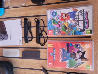 Nintendo Switch + Juegos y Accesorios