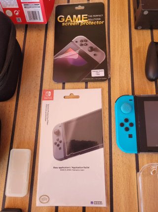 Nintendo Switch + Juegos y Accesorios