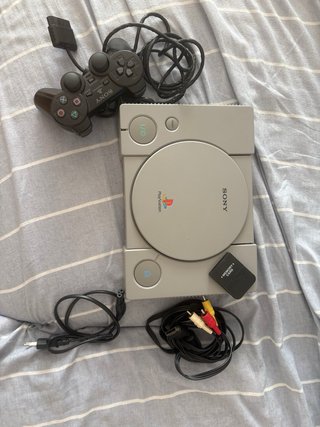 PlayStation 1 (PS1) gris