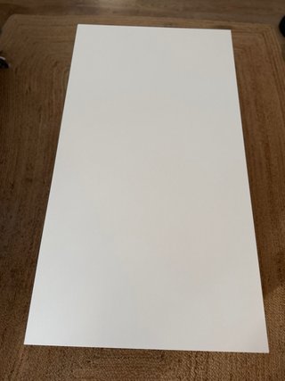 Mesa de centro con tablero elevable