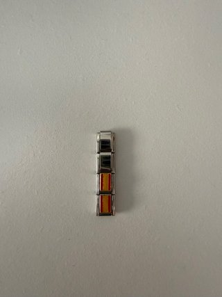 Lote de pulseras de acero plateado.