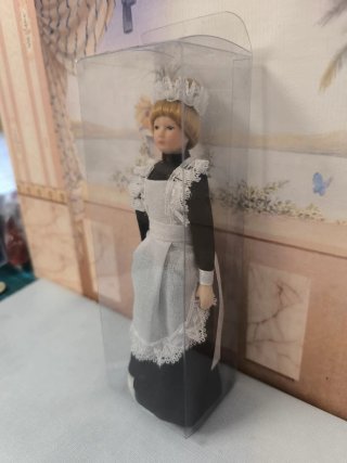 Miniatura bambola per casa delle bambole