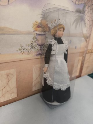 Miniatura bambola per casa delle bambole