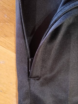 Pantalón chándal Puma negro y naranja