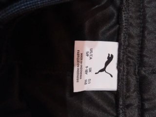 Pantalón chándal Puma negro y naranja