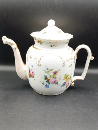 Tetera o cafetera de porcelana antigua