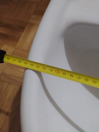 Lavabo con pie blanco marca Roca