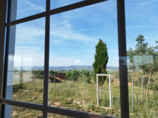 Terreno rustico con casa de campo