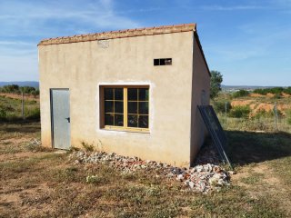 Terreno rustico con casa de campo