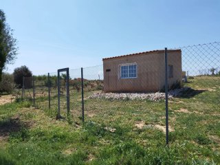 Terreno rustico con casa de campo