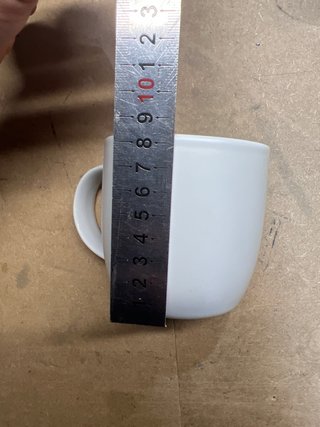 Taza de cerámica blanca