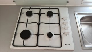 Placa de gas blanca con encendido