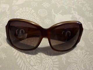 Gafas Miu Miu marrones con estuche