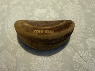 Gafas Miu Miu marrones con estuche