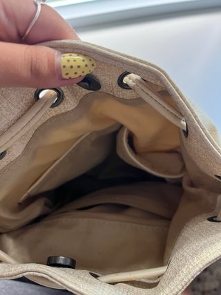 Bolso beige y multicolor con flecos
