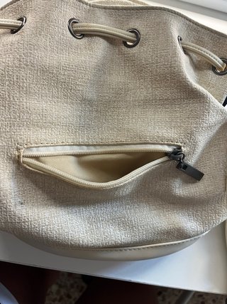Bolso beige y multicolor con flecos