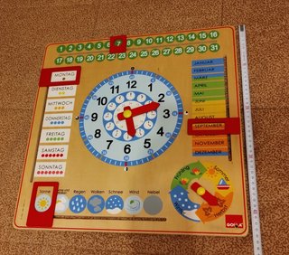 Reloj calendario Goula madera iniciación al alemán
