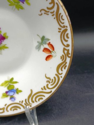 Taza y platillo Saxe de porcelana