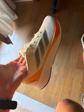 Zapatillas Adidas Duramo blancas y naranja