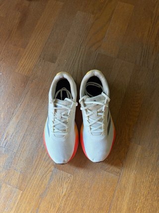 Zapatillas Adidas Duramo blancas y naranja