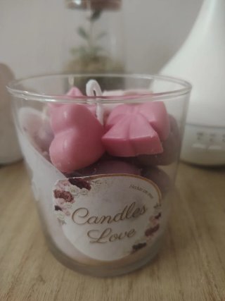 Velas decorativas multicolor en vaso de cristal