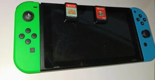 Nintendo Switch + 2 Juegos +mando adicional