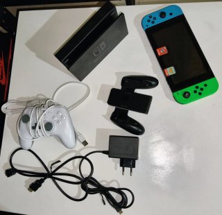 Nintendo Switch + 2 Juegos +mando adicional
