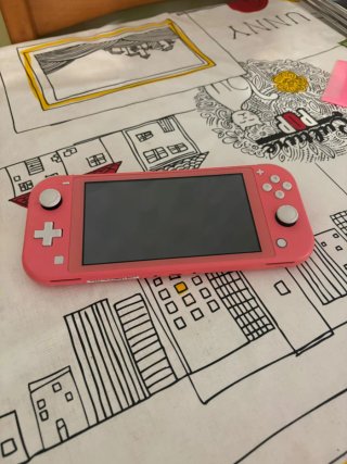 Nintendo Switch Lite Rosa + Gioco