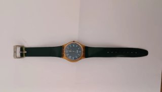 Swatch anni92 oro e verde