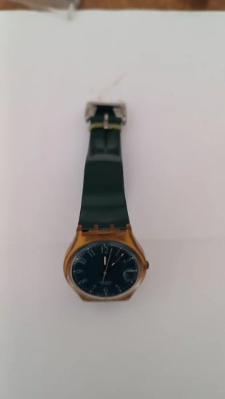 Swatch anni92 oro e verde