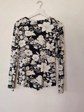Blusa estampada manga larga