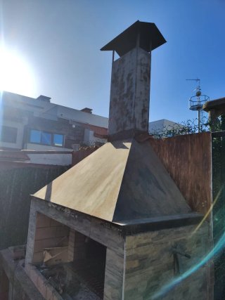 Campana de hierro para barbacoa