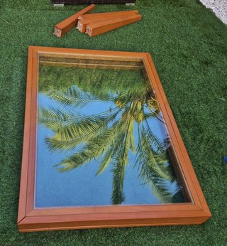 Mesa de comedor extensible de madera y cristal