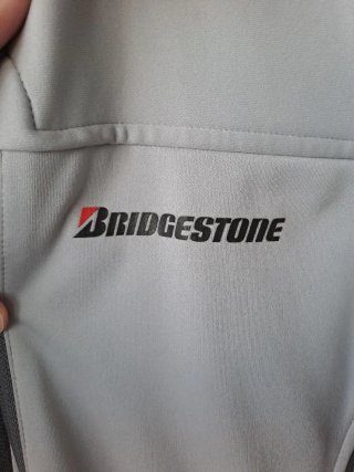 Chaqueta Bridgestone gris